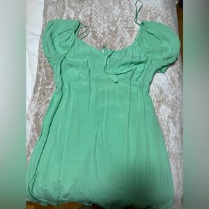 Greenish teal dress. Cinches you and makes you look hourglass.